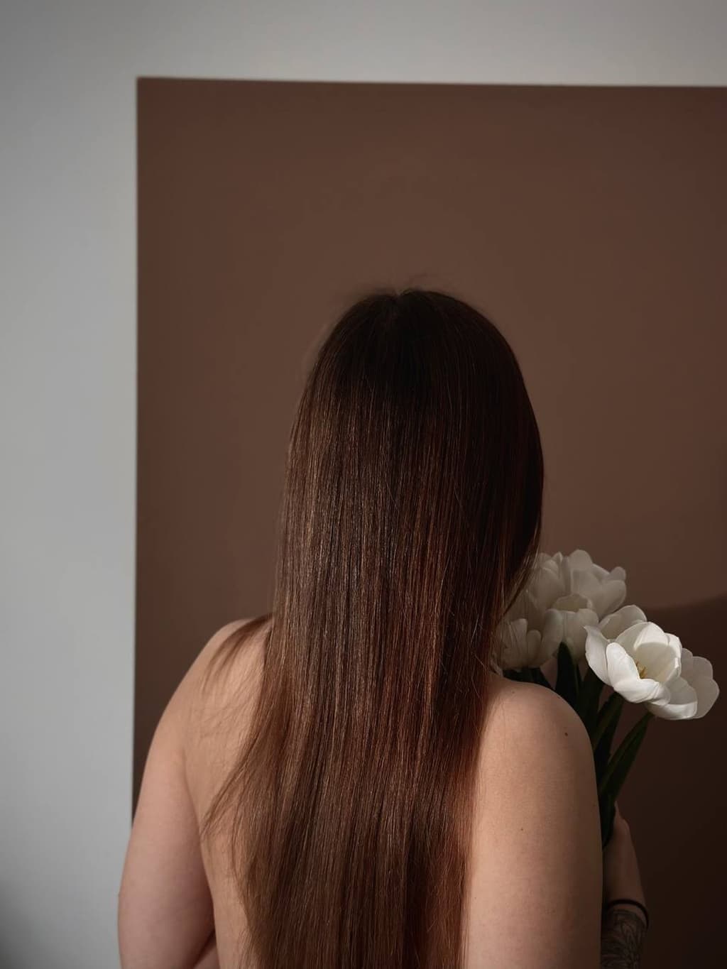 Клієнтка з квітами